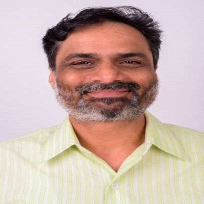 portrait of indian businessman against white background